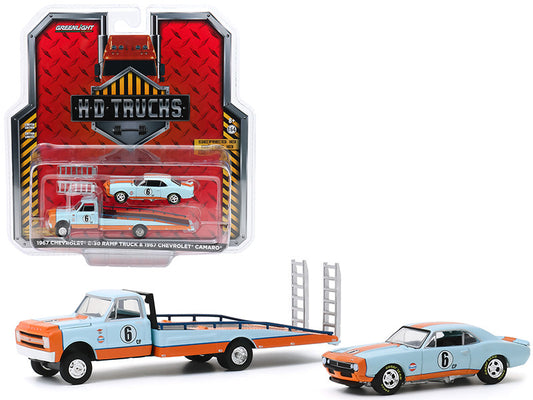 1967 chevrolet c-30 ramp truck and 1967 chevrolet camaro #6 \gulf oil\" light blue and orange \"h.d. trucks\" series 18 1/64 diecast model cars